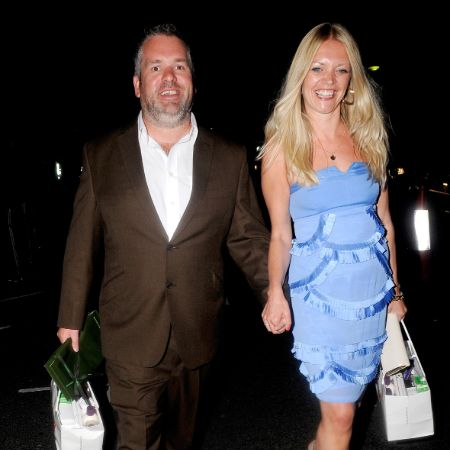 Chris and his ex-girlfriend, Sophie holding their hands